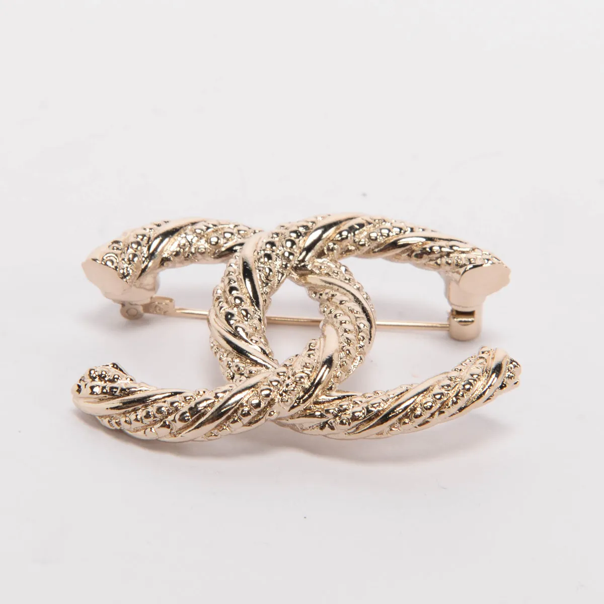 Chanel Light Gold Twisted CC Brooch