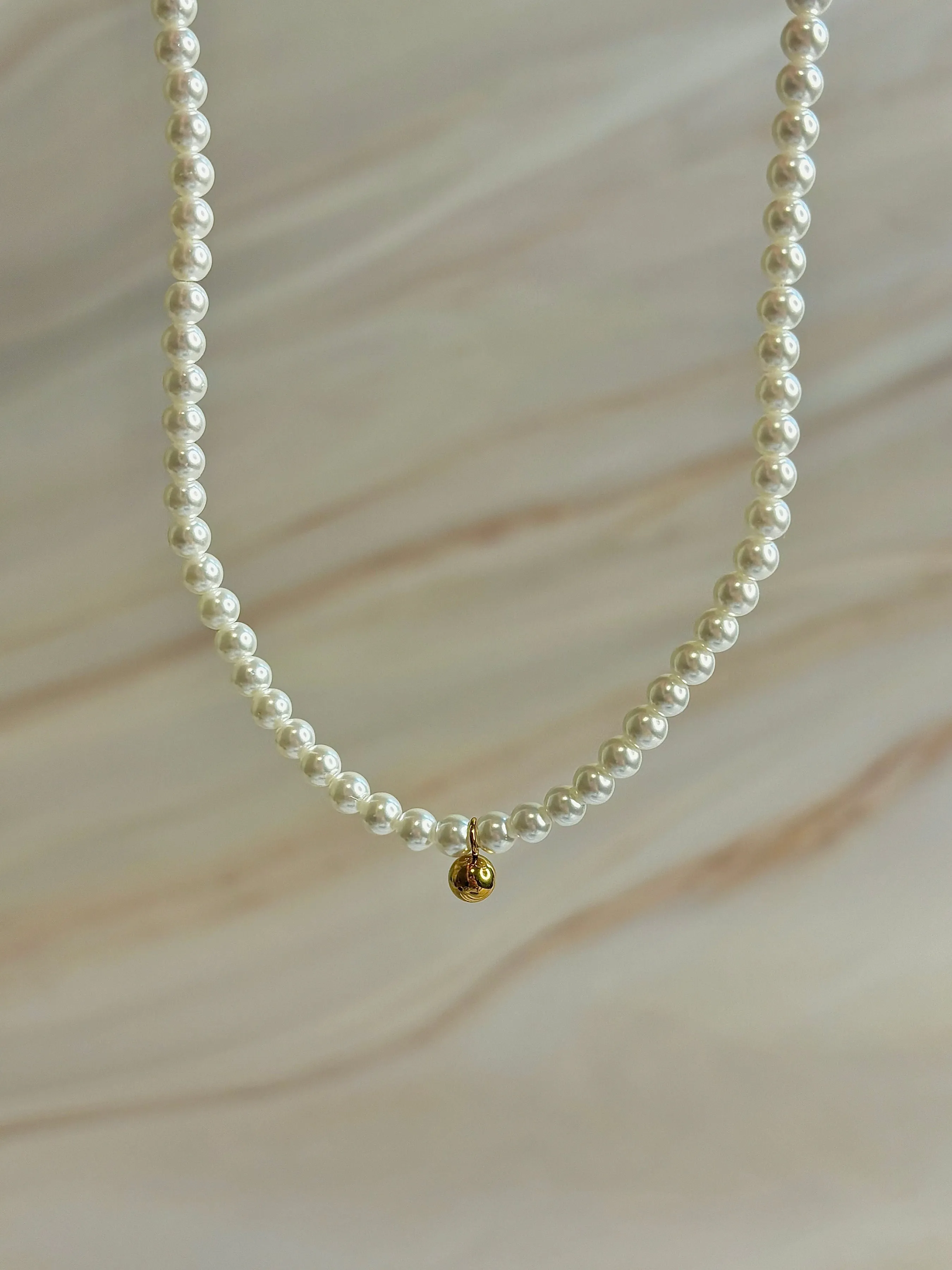 Luminous Pearl Ball Necklace - Timeless Elegance