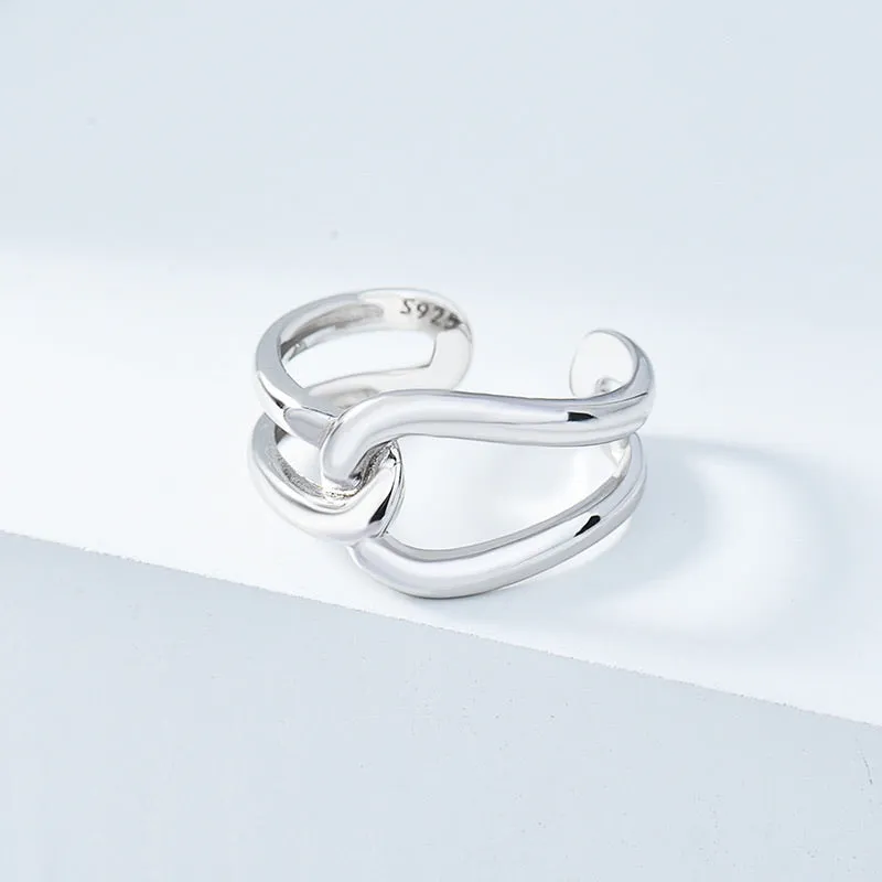Minimalist Crossed Cercle Ring