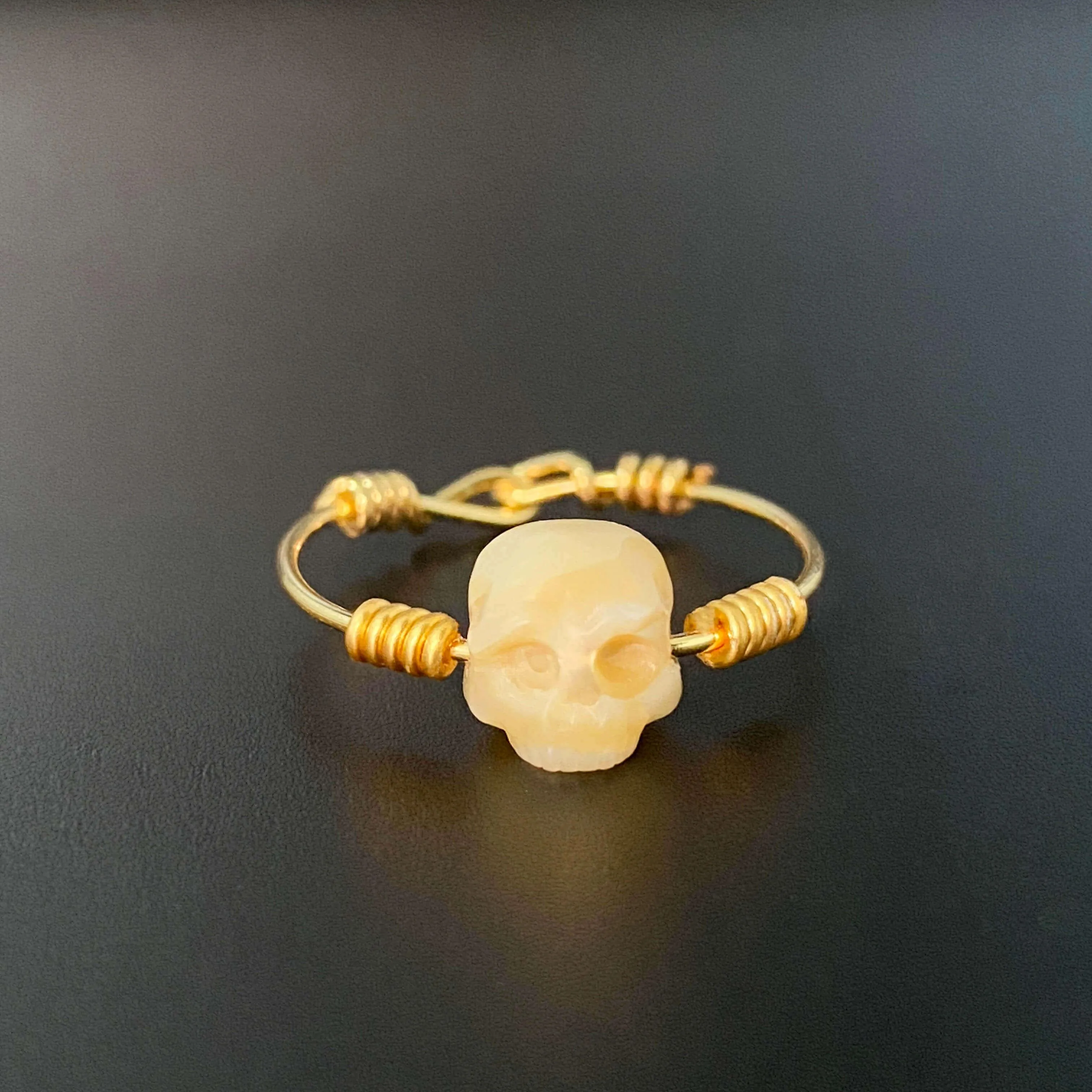 Minimalist Pearl Cranium Twisted Knot Ring