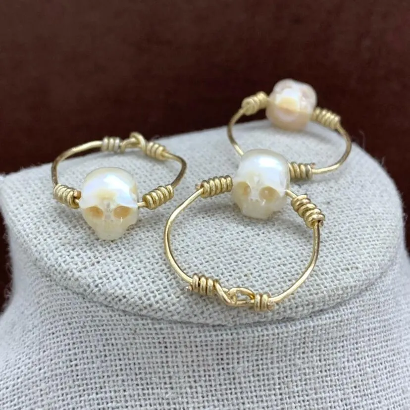 Minimalist Pearl Cranium Twisted Knot Ring