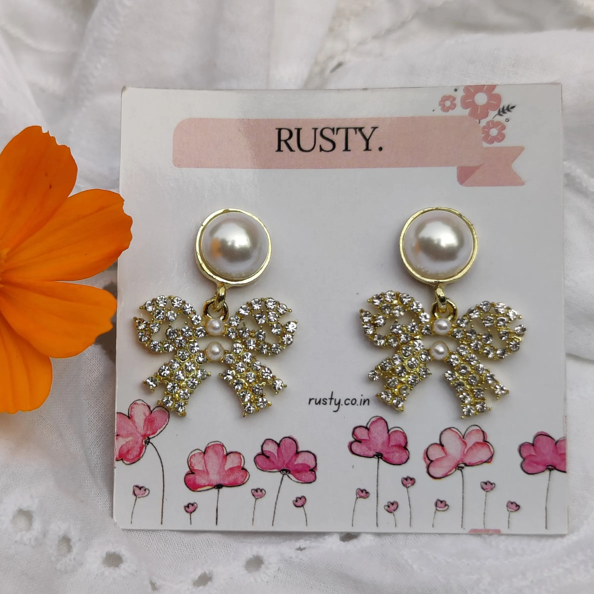 Pearl & Crystal Bow Drop Earrings by Rusty