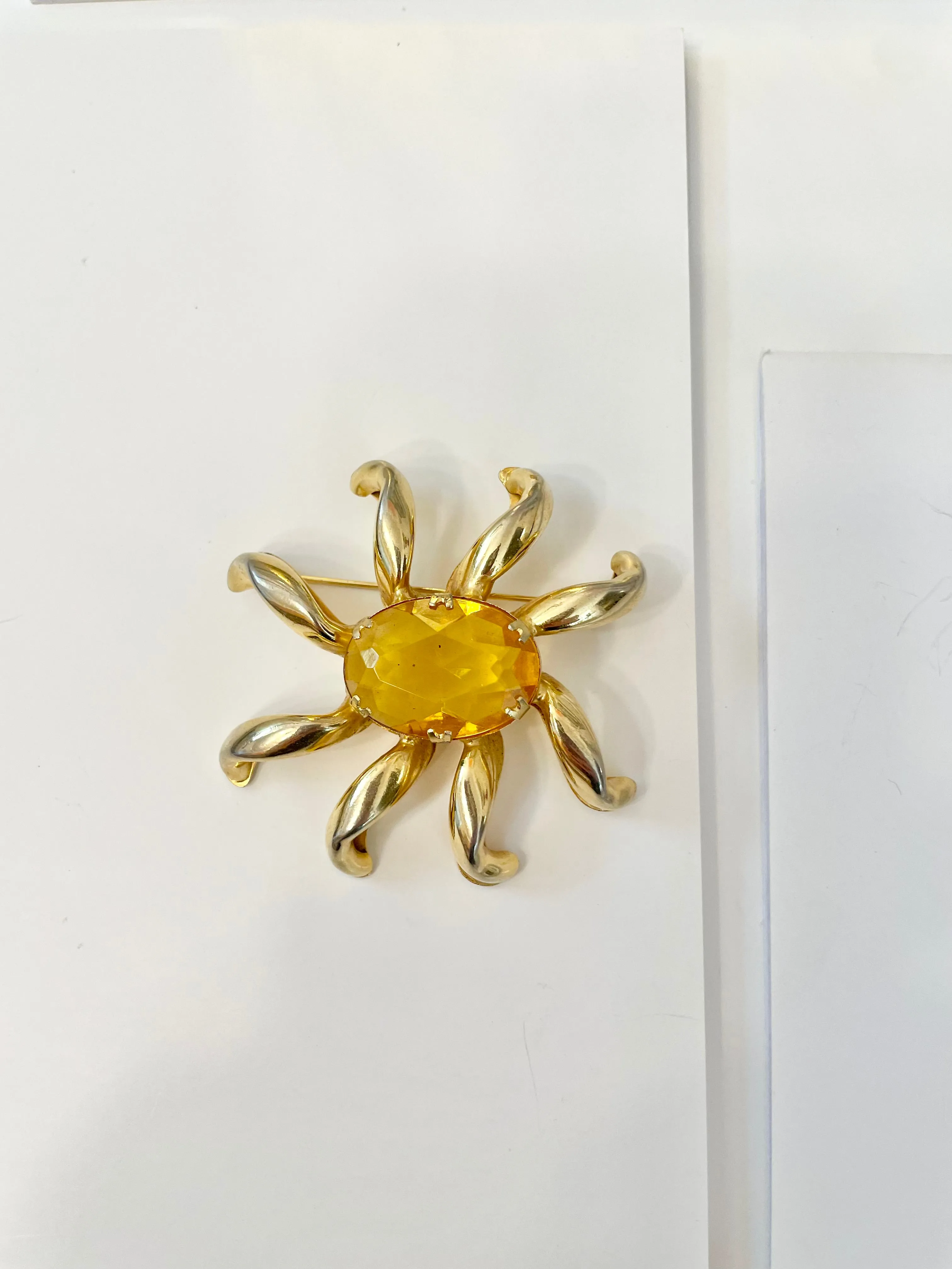 The most divine citrine glass, starburst gold classy brooch...